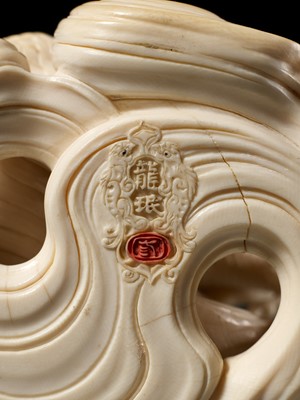 Lot 146 - RYUMIN: AN IMPRESSIVE TOKYO SCHOOL IVORY OKIMONO OF SHO-KANNON WITH DRAGON