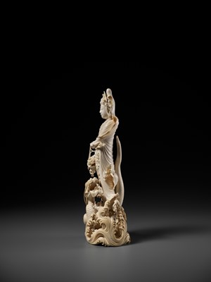 Lot 146 - RYUMIN: AN IMPRESSIVE TOKYO SCHOOL IVORY OKIMONO OF SHO-KANNON WITH DRAGON