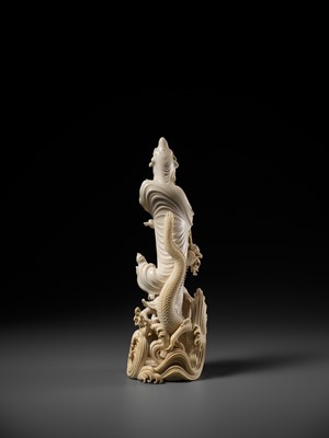 Lot 146 - RYUMIN: AN IMPRESSIVE TOKYO SCHOOL IVORY OKIMONO OF SHO-KANNON WITH DRAGON