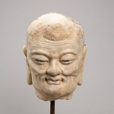 Lot 1024 - A STUCCO HEAD OF A LUOHAN, YUAN TO MING