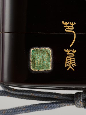 Lot 27 - KAN: A SUPERB CERAMIC-INLAID THREE-CASE LACQUER INRO DEPICTING A PARROT, WITH HAIKU POEM BY MATSUO BASHO