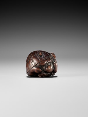 Lot 220 - MASAKAZU: A NAGOYA SCHOOL WOOD NETSUKE OF A COWERING ONI DURING SETSUBUN