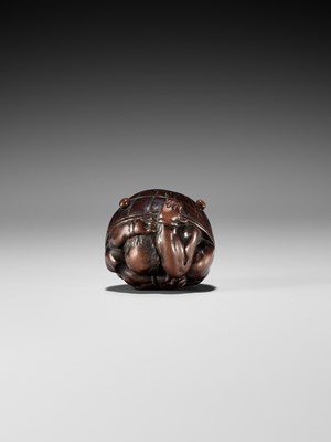 Lot 220 - MASAKAZU: A NAGOYA SCHOOL WOOD NETSUKE OF A COWERING ONI DURING SETSUBUN