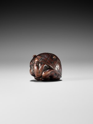 Lot 220 - MASAKAZU: A NAGOYA SCHOOL WOOD NETSUKE OF A COWERING ONI DURING SETSUBUN