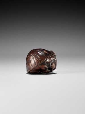 Lot 220 - MASAKAZU: A NAGOYA SCHOOL WOOD NETSUKE OF A COWERING ONI DURING SETSUBUN