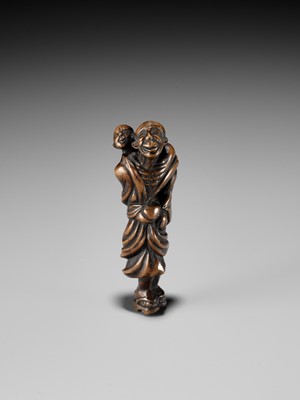 Lot 233 - AN OLD EDO SCHOOL WOOD NETSUKE OF AN OLD MAN WITH CHILD