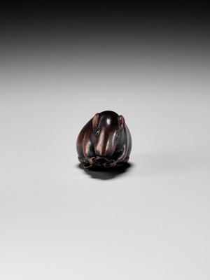 Lot 338 - GYOKUZAN: A FINE WOOD NETSUKE OF A RAT WITH EDAMAME BEAN PODS