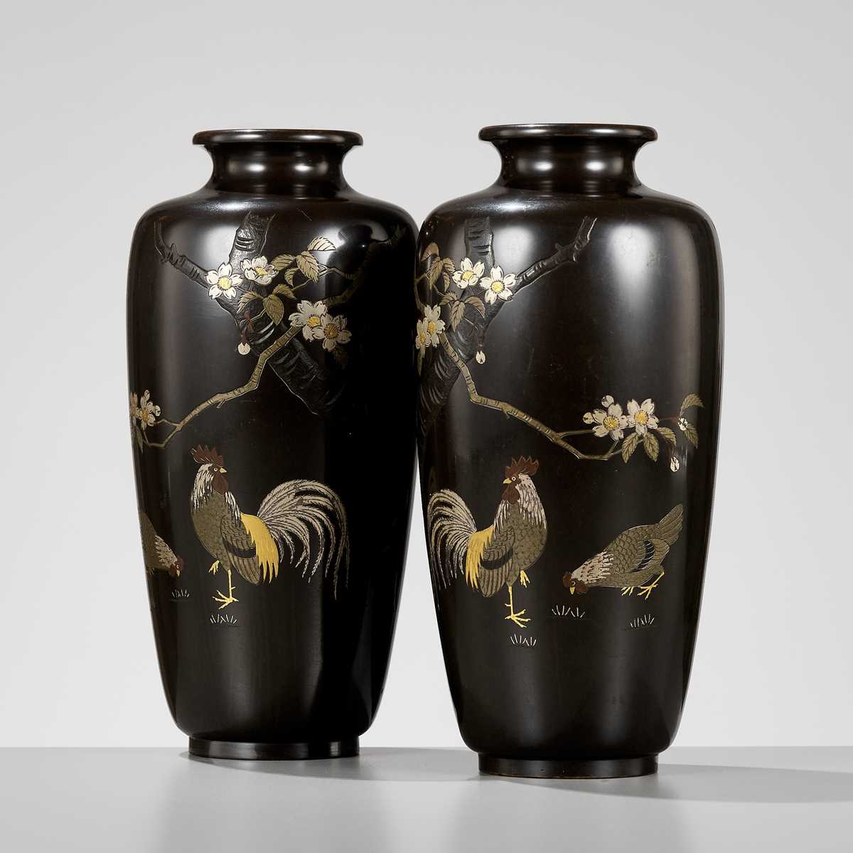 Lot 271 - KANEYOSHI: A PAIR OF GOLD AND SILVER INLAID BRONZE BALUSTER VASES WITH LONG-TAILED ROOSTERS (ONAGADORI)