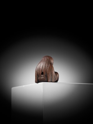 Lot 610 - TADATOSHI: A SUPERB NAGOYA SCHOOL WOOD NETSUKE OF A SLEEPING SHOJO
