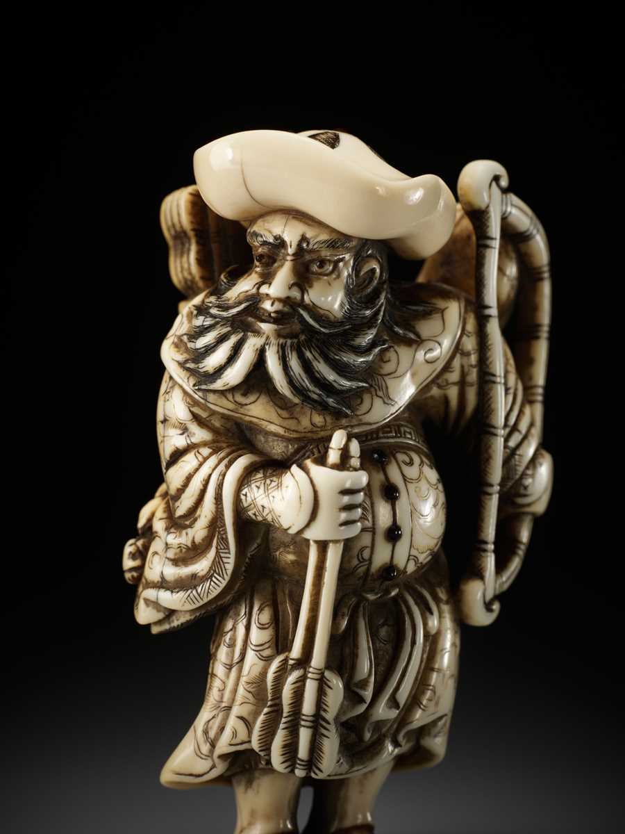 Netsuke Definition OKAKOTO: AN IMPRESSIVE AND LARGE IVORY NETSUKE OF A