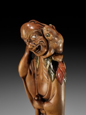 Lot 87 - A SUPERB AND VERY LARGE INLAID WOOD NETSUKE OF GAMA SENNIN