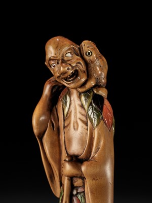 Lot 87 - A SUPERB AND VERY LARGE INLAID WOOD NETSUKE OF GAMA SENNIN