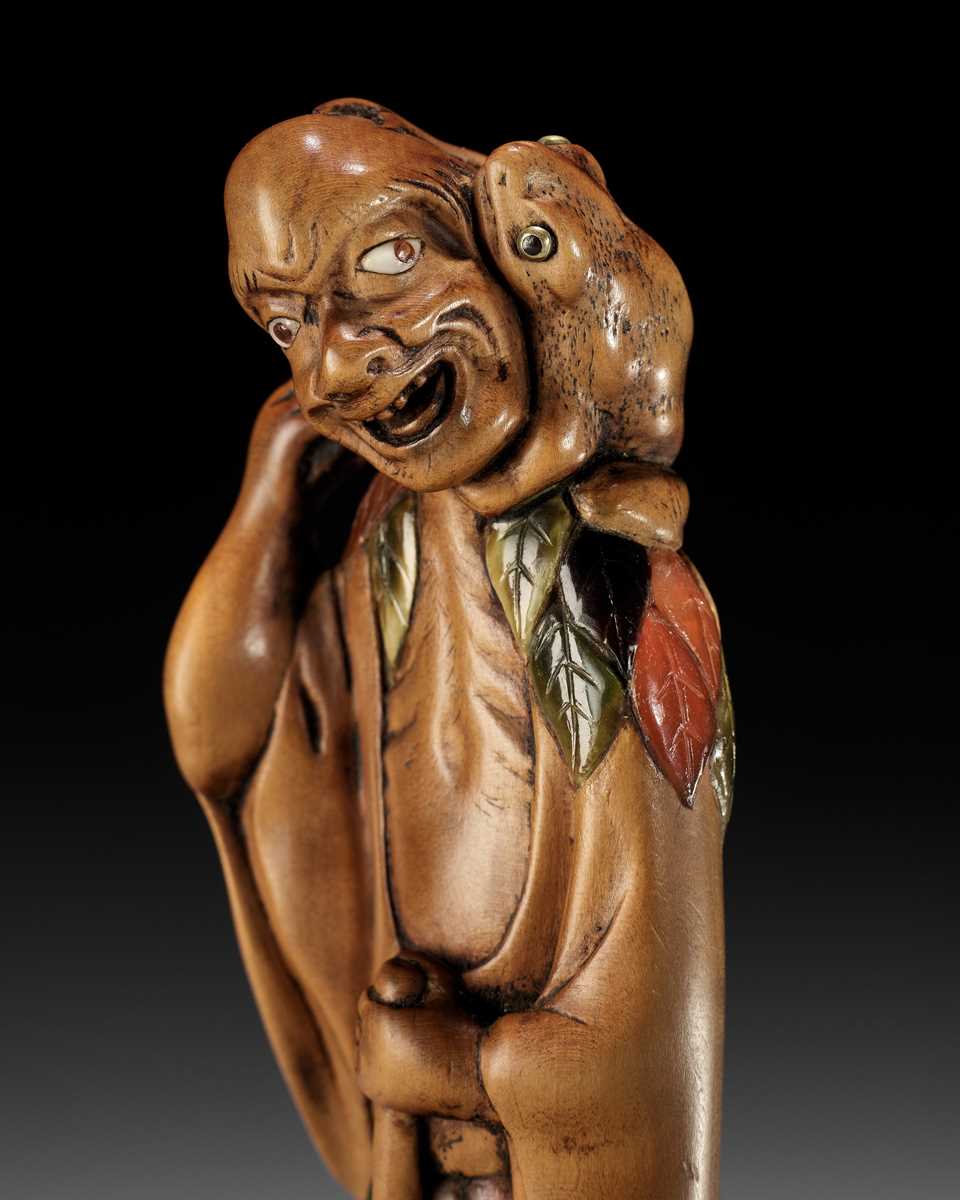 Lot 87 - A SUPERB AND VERY LARGE INLAID WOOD NETSUKE OF GAMA SENNIN