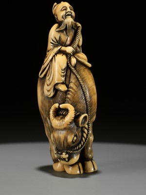 Lot 105 - A FINE IVORY NETSUKE OF ROSHI ON AN OX