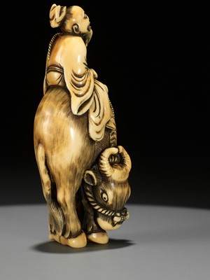 Lot 105 - A FINE IVORY NETSUKE OF ROSHI ON AN OX