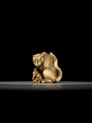 Lot 139 - A SUPERB IVORY NETSUKE OF A TIGER WITH CUB, ATTRIBUTED TO TOMOTADA