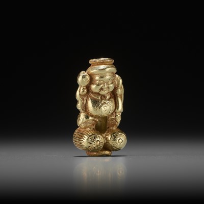 Lot 521 - A SOLID GOLD OJIME OF DAIKOKU