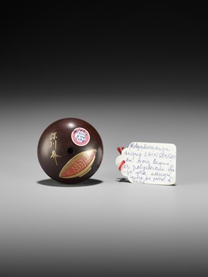 Lot 332 - FUKAGAWASAI: A FINE LACQUER MANJU NETSUKE DEPICTING SHOJO WITH A SAKE JAR AND SAUCER