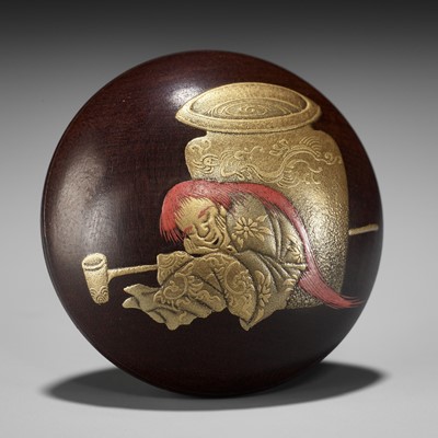 Lot 332 - FUKAGAWASAI: A FINE LACQUER MANJU NETSUKE DEPICTING SHOJO WITH A SAKE JAR AND SAUCER