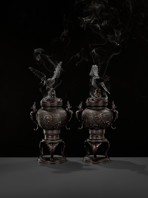 Lot 264 - A PAIR OF BRONZE KORO (CENSER) AND COVERS WITH EAGLE AND DRAGONS