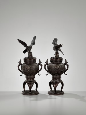 Lot 264 - A PAIR OF BRONZE KORO (CENSER) AND COVERS WITH EAGLE AND DRAGONS