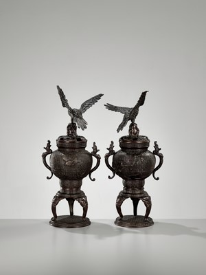 Lot 264 - A PAIR OF BRONZE KORO (CENSER) AND COVERS WITH EAGLE AND DRAGONS