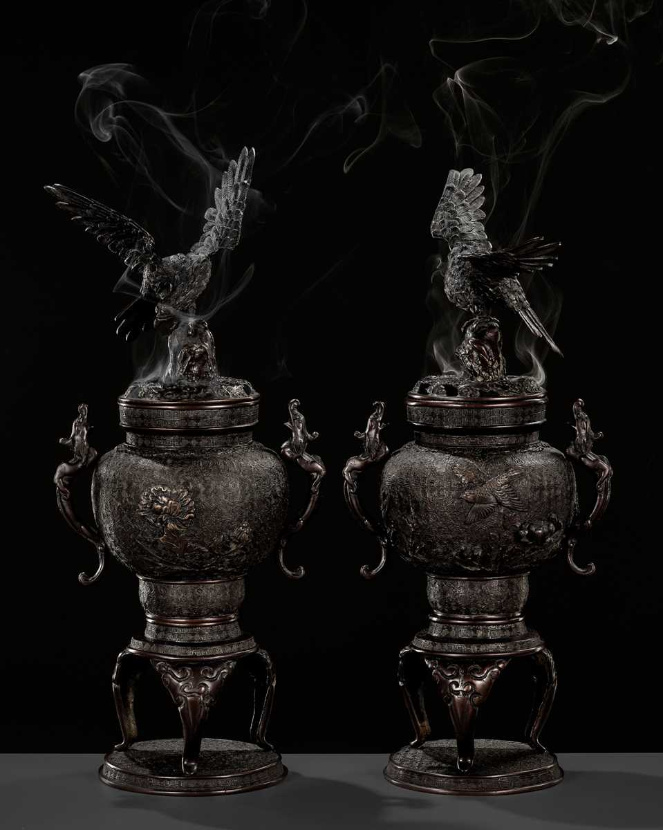 Lot 264 - A PAIR OF BRONZE KORO (CENSER) AND COVERS WITH EAGLE AND DRAGONS
