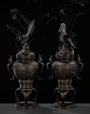 Lot 264 - A PAIR OF BRONZE KORO (CENSER) AND COVERS WITH EAGLE AND DRAGONS
