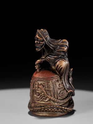 Lot 116 - A SUPERB AND RARE WOOD AND LACQUER NETSUKE OF KIYOHIME