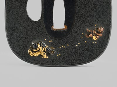 Lot 300 - A FINE SHAKUDO TSUBA DEPICTING THE ONI-YARAI CEREMONY