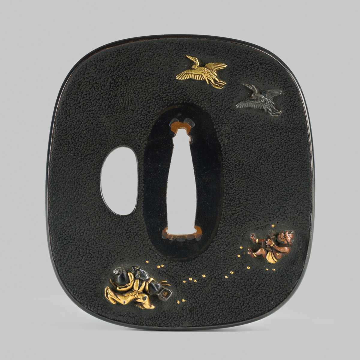 Lot 300 - A FINE SHAKUDO TSUBA DEPICTING THE ONI-YARAI CEREMONY