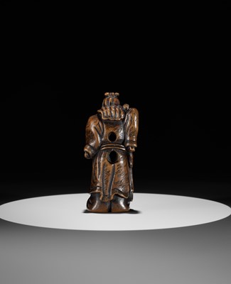 Lot 20 - A POWERFUL WOOD NETSUKE OF KAN’U WITH HIS HALBERD