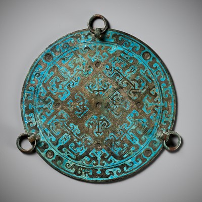 Lot 302 - A RARE TURQUOISE-INLAID BRONZE MIRROR, WARRING STATES PERIOD