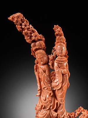 Lot 280 - A LARGE CORAL CARVING OF TWO MEIREN