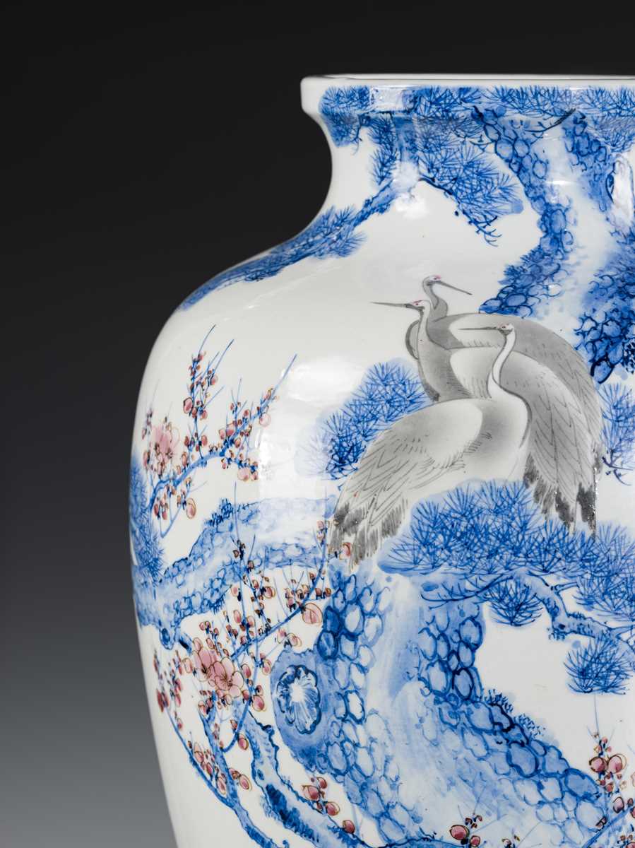 Lot 239 - A LARGE BALUSTER ARITA VASE WITH CRANES, PINE, AND PRUNUS TREES