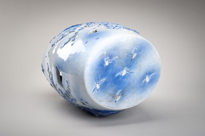 Lot 241 - A LARGE AND HEAVY BLUE AND WHITE ‘KOI’ GARDEN STOOL