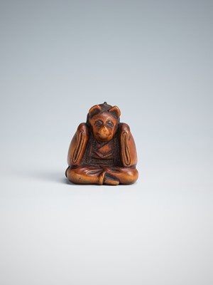 Lot 390 - A CHARMING WOOD NETSUKE OF A KARAKO WEARING A KITSUNE MASK