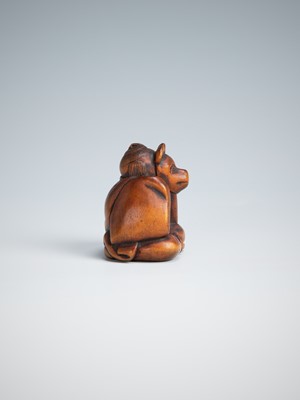 Lot 390 - A CHARMING WOOD NETSUKE OF A KARAKO WEARING A KITSUNE MASK