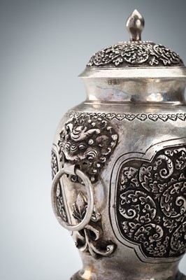 A FINE SILVER VASE WITH MASK HANDLES
