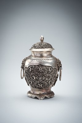 A FINE SILVER VASE WITH MASK HANDLES