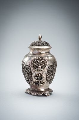 A FINE SILVER VASE WITH MASK HANDLES