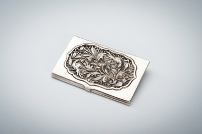 AN OPENWORK SILVER CARD CASE