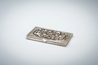 AN OPENWORK SILVER CARD CASE