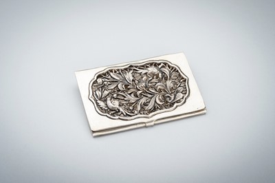 AN OPENWORK SILVER CARD CASE