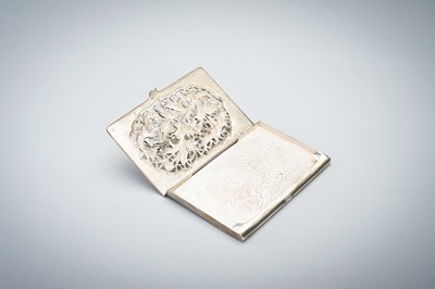 AN OPENWORK SILVER CARD CASE