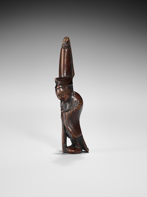 Lot 367 - A FINE EDO SCHOOL WOOD NETSUKE OF A SLEEPING TEMPLE SERVANT