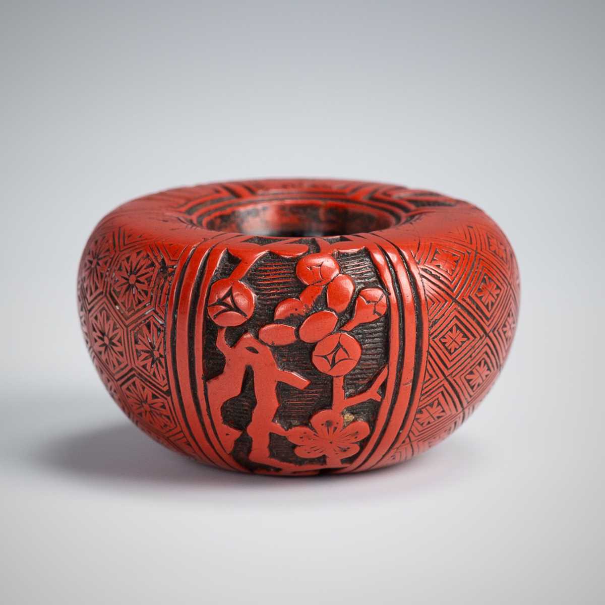 Lot 412 - A RARE TSUISHU LACQUER ASHTRAY NETSUKE DEPICTING THE THREE FRIENDS OF WINTER (SHOCHIKUBAI)