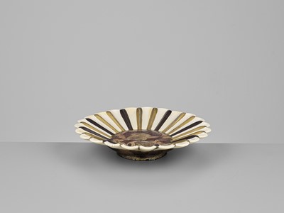 A LACQUERED WOOD AND IVORY FOOTED DISH PLATE