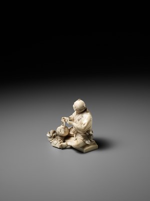 Lot 359 - SOZAN: AN IVORY OKIMONO OF A FARMER DRINKING TEA