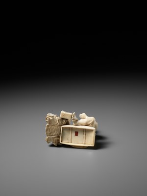 Lot 359 - SOZAN: AN IVORY OKIMONO OF A FARMER DRINKING TEA